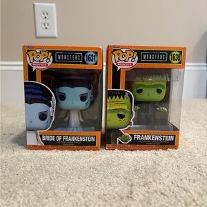 Funko Monsters Pop Figures - Green and Black